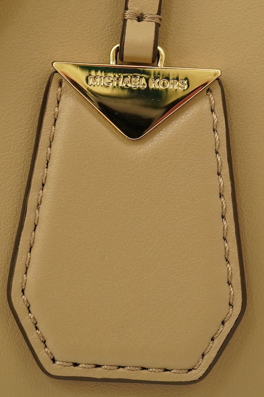 A Michael Kors taupe leather handbag